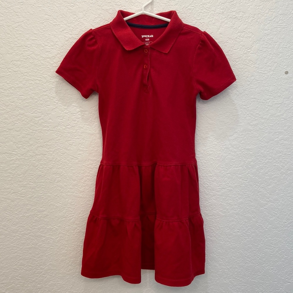 TSLA girls short sleeve school uniform dress.  Ruffle pique polo